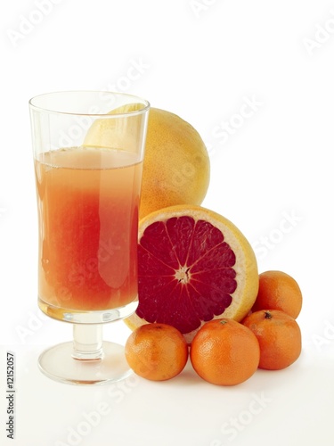 grapefruits and juice in a glass