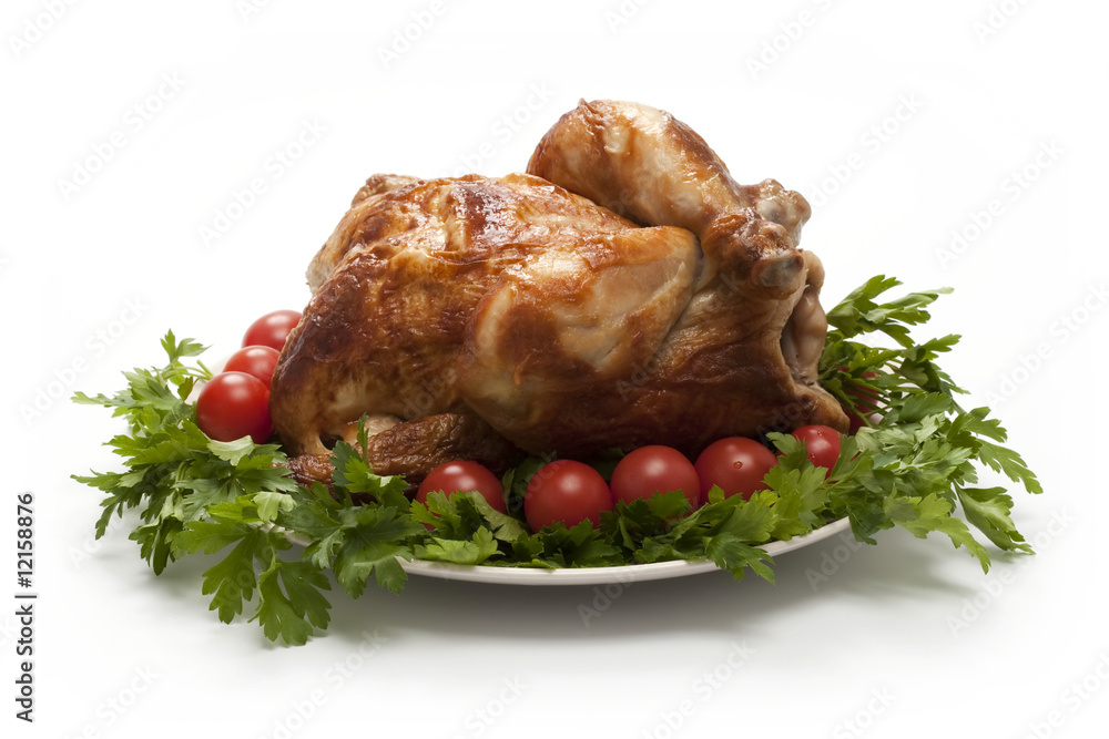 Roasted chicken (turkey) garnished with tomatoes