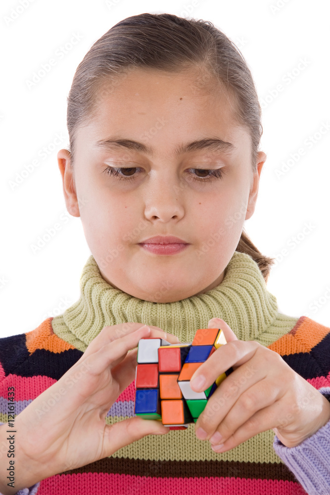 Little girl playing with a colorfull cube Little girl playing with a colorfull cube