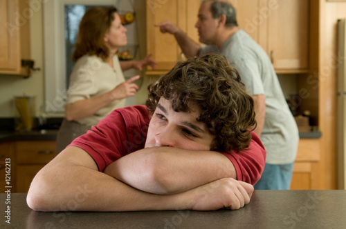 Teenage boy suffers while parents fight