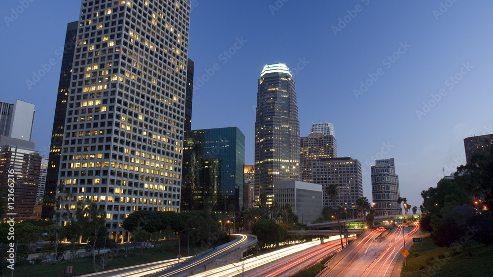 Los Angeles skyline and freeway at dusk