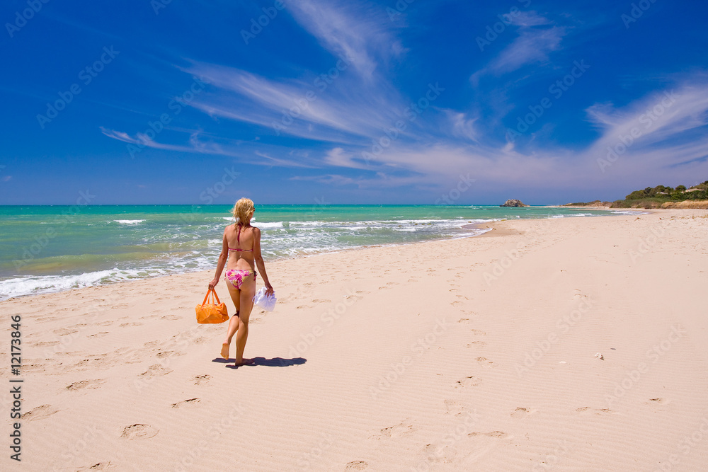 a beutiful woman on the beach in Mediterranean a beutiful woman on the beach in Mediterranean