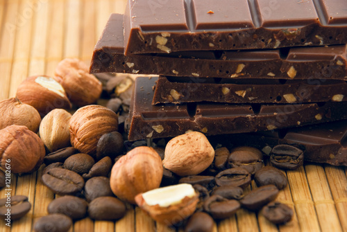 chocolate, nuts and grains of coffee