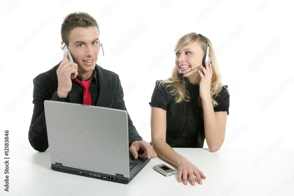 Young business couple laptop isolated on white Young business couple laptop isolated on white