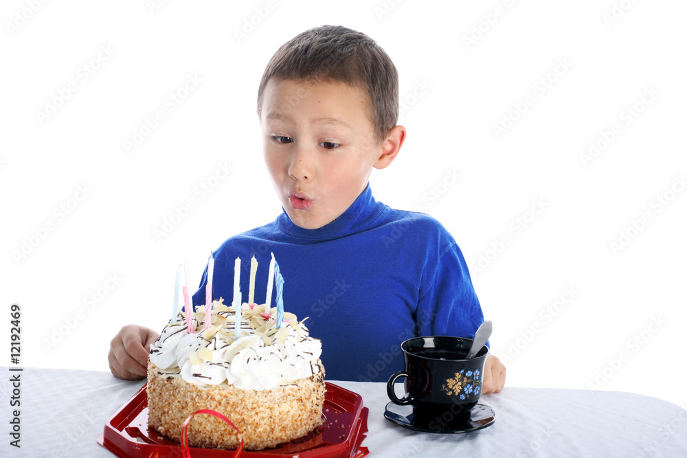 boy with birthday cake isolated on white boy with birthday cake isolated on white