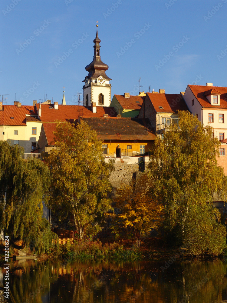 The old town Pisek on the river Otava with blue sky