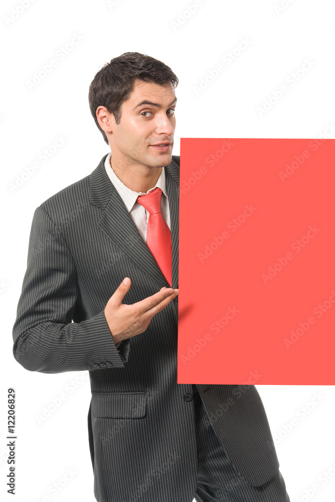 Businessman standing with red signboard, isolated Businessman standing with red signboard, isolated