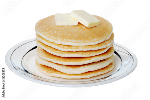 Isolated pancakes with butter