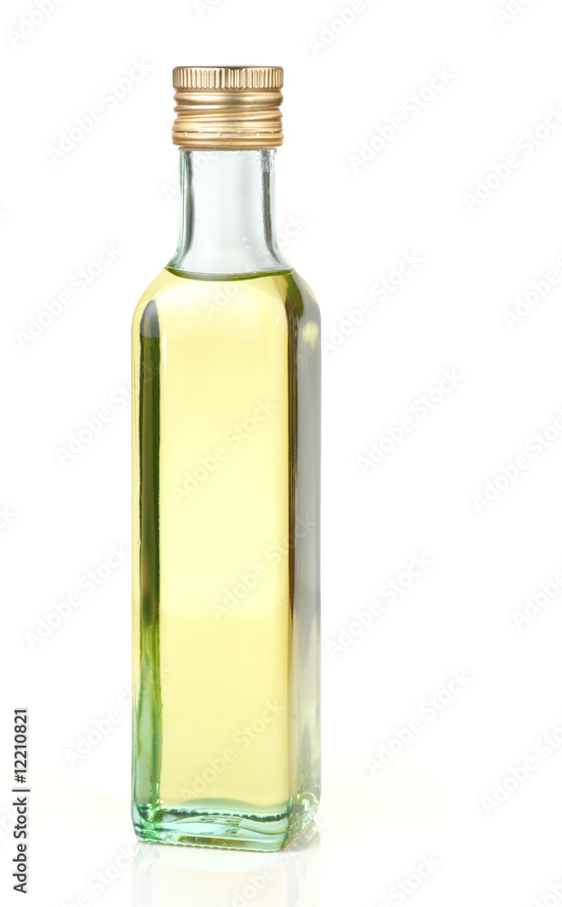 Grape seed oil in glass bottle, isolated