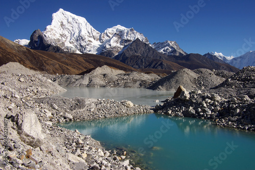 Picturesque nepalese landscape with a lake and Arakam Tse 6423m