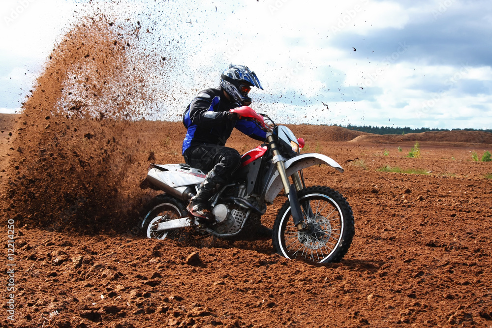 Fototapeta premium Off-road motorbike driving in dirt.