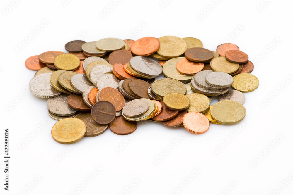 A group of old coins isolated on white A group of old coins isolated on white