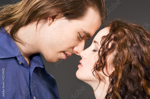 Young Man and woman in anticipation of kiss