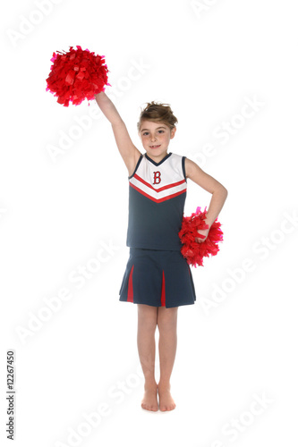 young girl in cheerleader outfit and ponpons