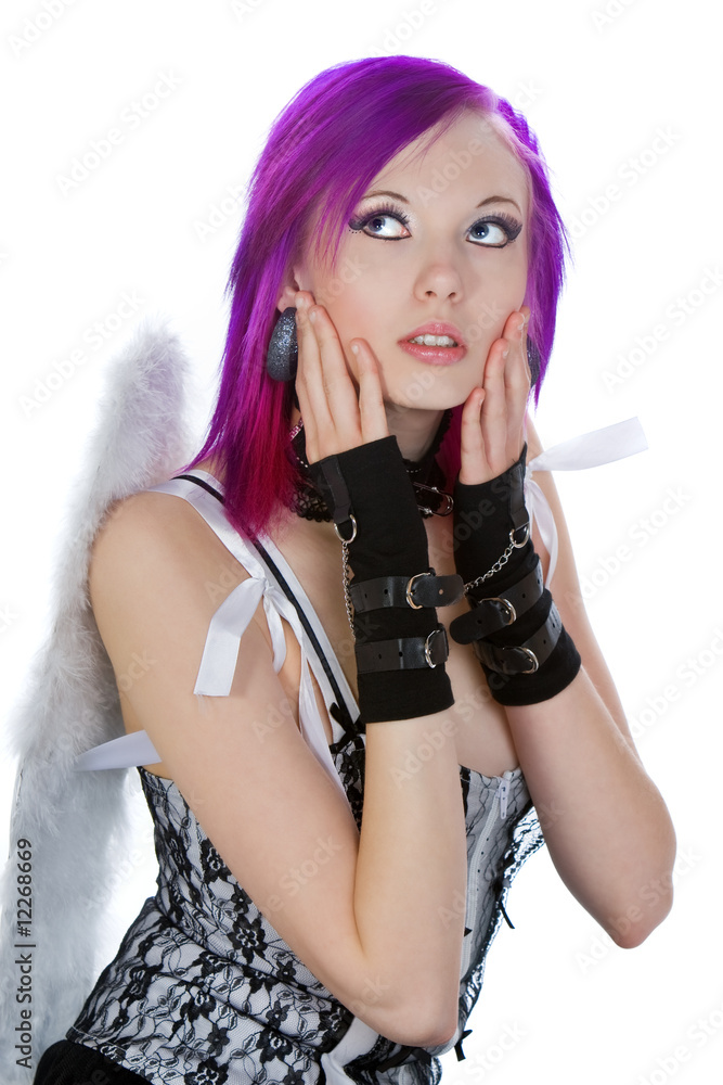 Attractive Emo Girl with Angel Wings Holding Face Attractive Emo Girl with Angel Wings Holding Face
