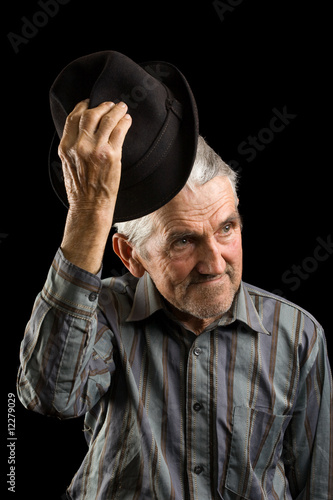 Old man saluting