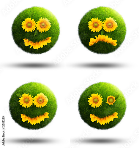 Fototapeta Naklejka Na Ścianę i Meble -  Grass planets showing their emotions with sunflowers