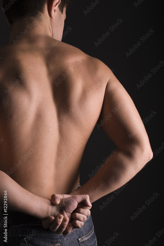 Young Sporty Man over Black Background, Body Parts