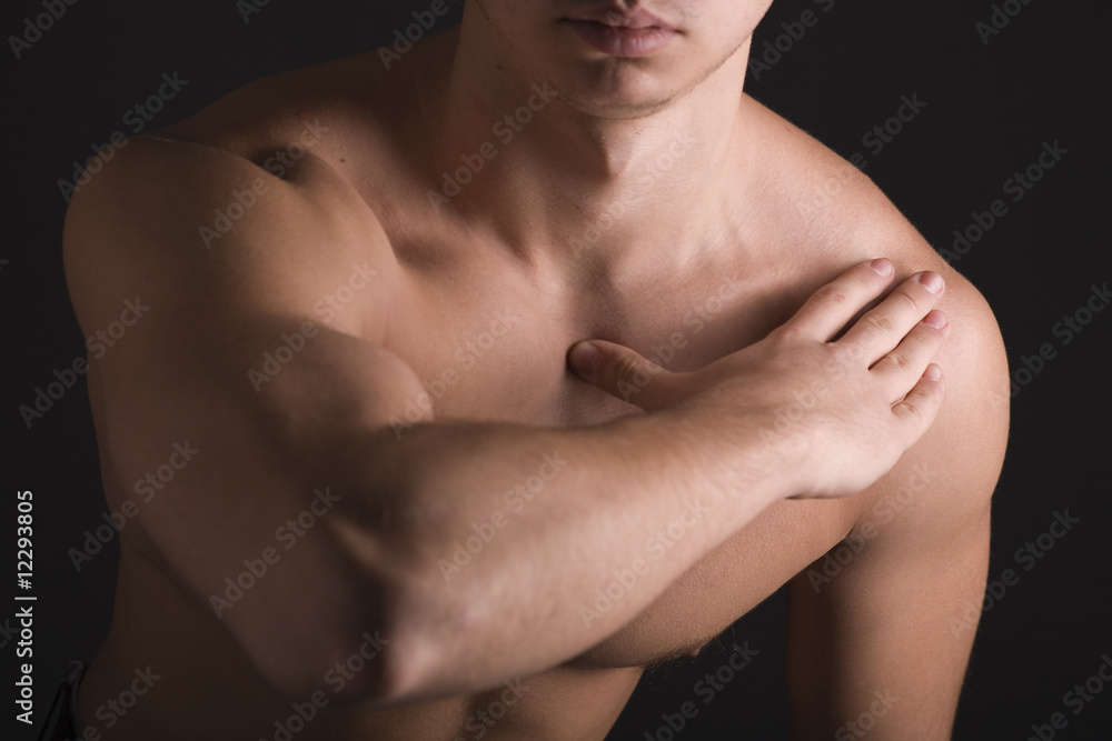 Young Sporty Man over Black Background, Body Parts Young Sporty Man over Black Background, Body Parts