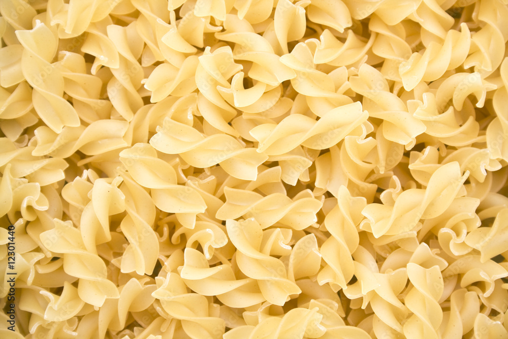curly pasta, closeup curly pasta, closeup