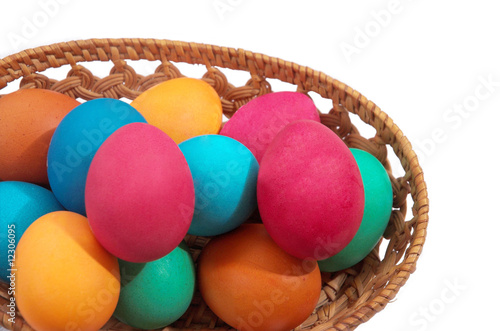 Colored eggs on a white background photo