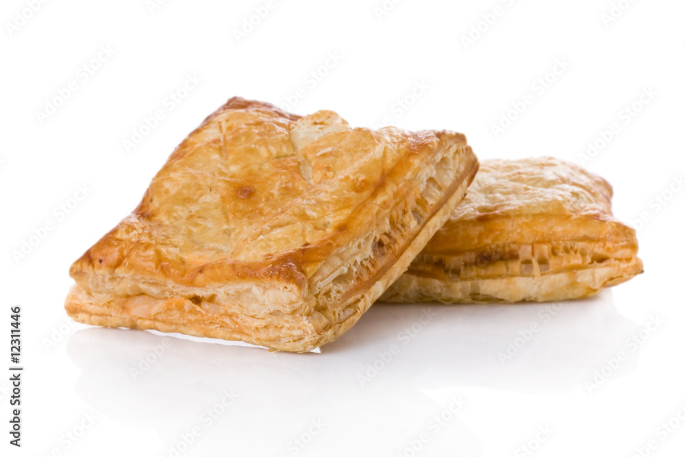 Puff pastry (sweet or salted) isolated on white background Puff pastry (sweet or salted) isolated on white background