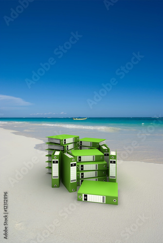 Green folders on the beach
