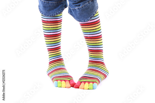 woman legs in strip sock on white background