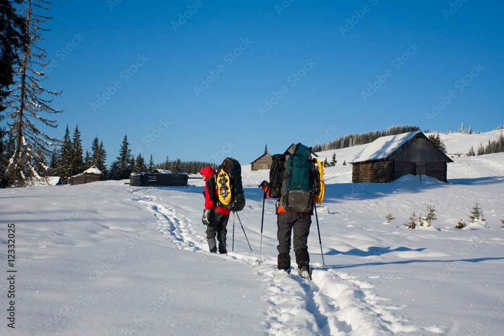 Hiker are in winter  mountains