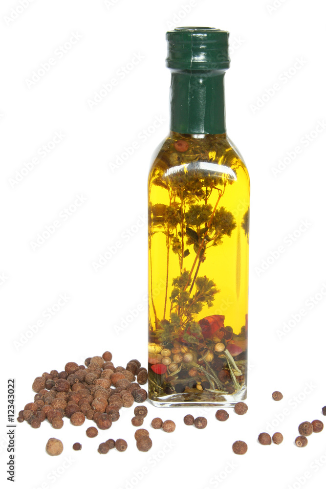Bottle of olive oil with spices and herbs Bottle of olive oil with spices and herbs