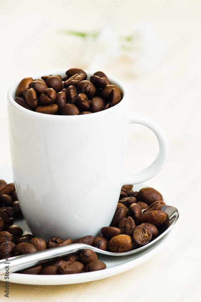 coffee beans in cup coffee beans in cup