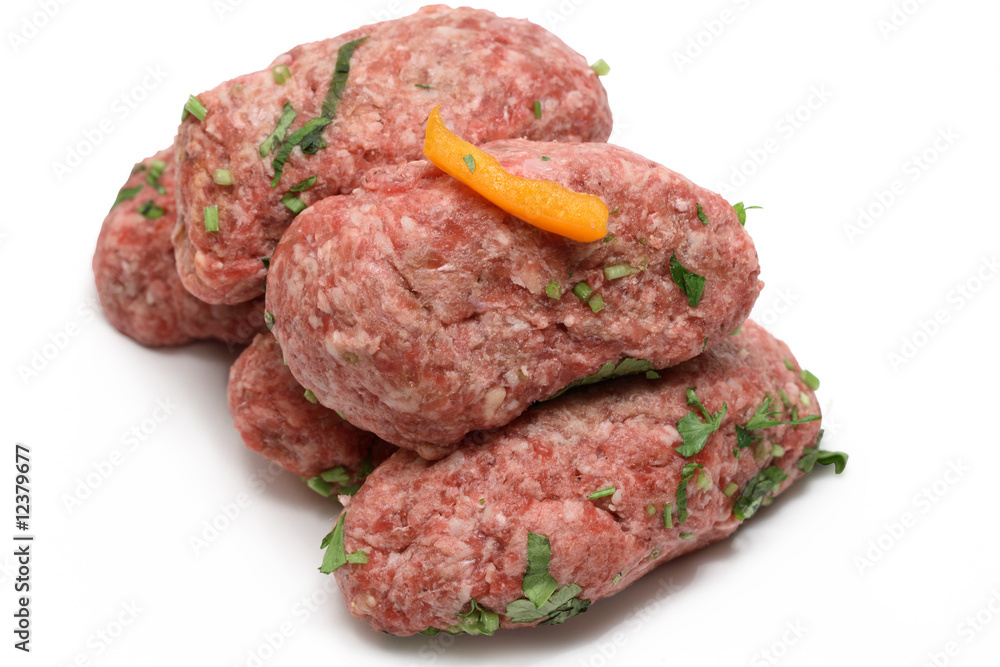 Raw meat rissoles isolated on white background