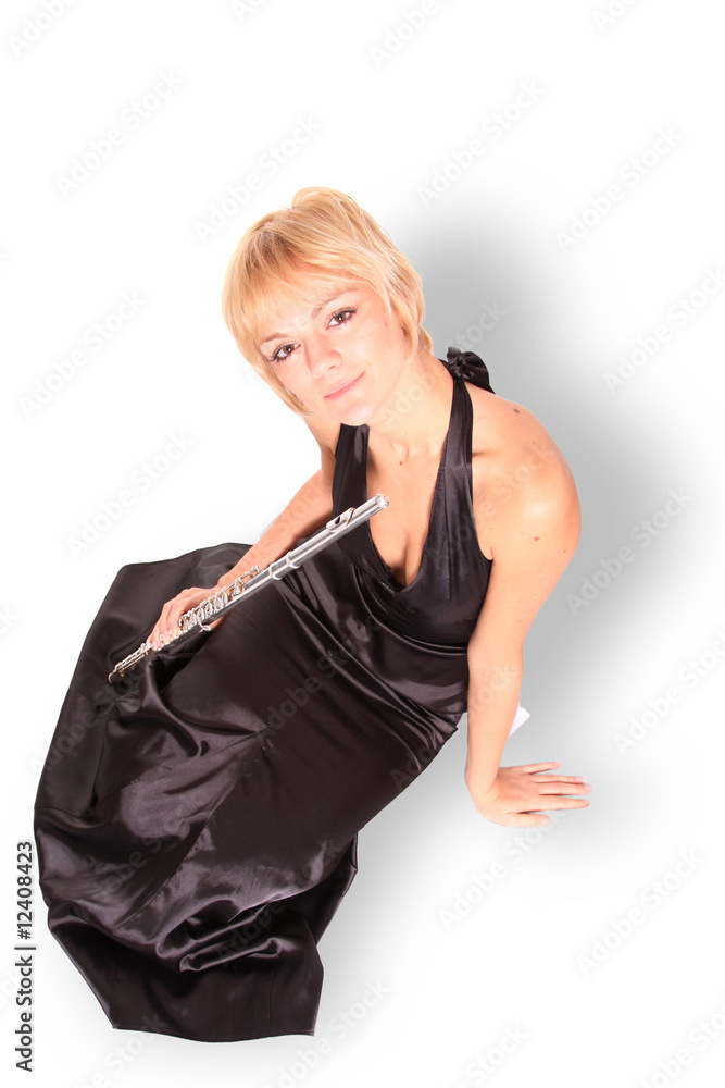 Portrait of a woman playing transverse flute Portrait of a woman playing transverse flute
