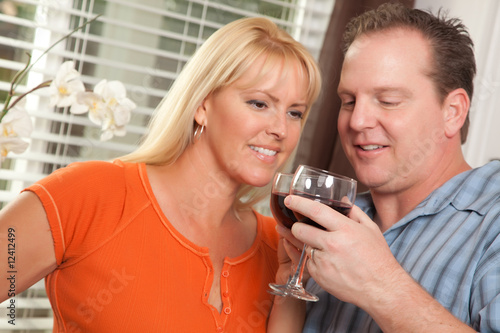 Young Couple Enjoying Wine