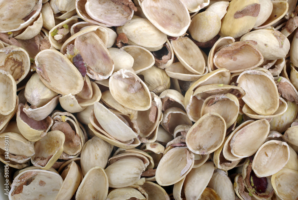 Nutshell of just eated pistachios full frame as background. Nutshell of just eated pistachios full frame as background.