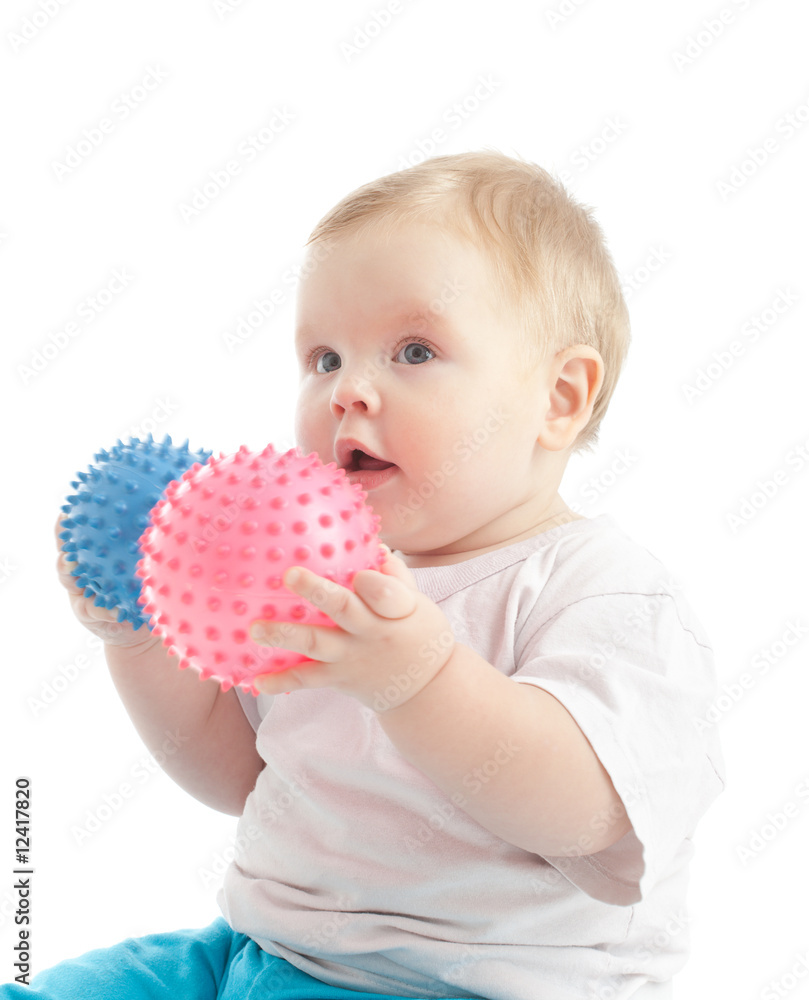 Portrait of little boy with two massage balls