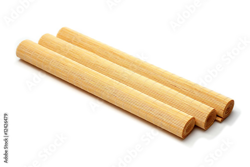 bamboo stick sushi pads isolated on a white background