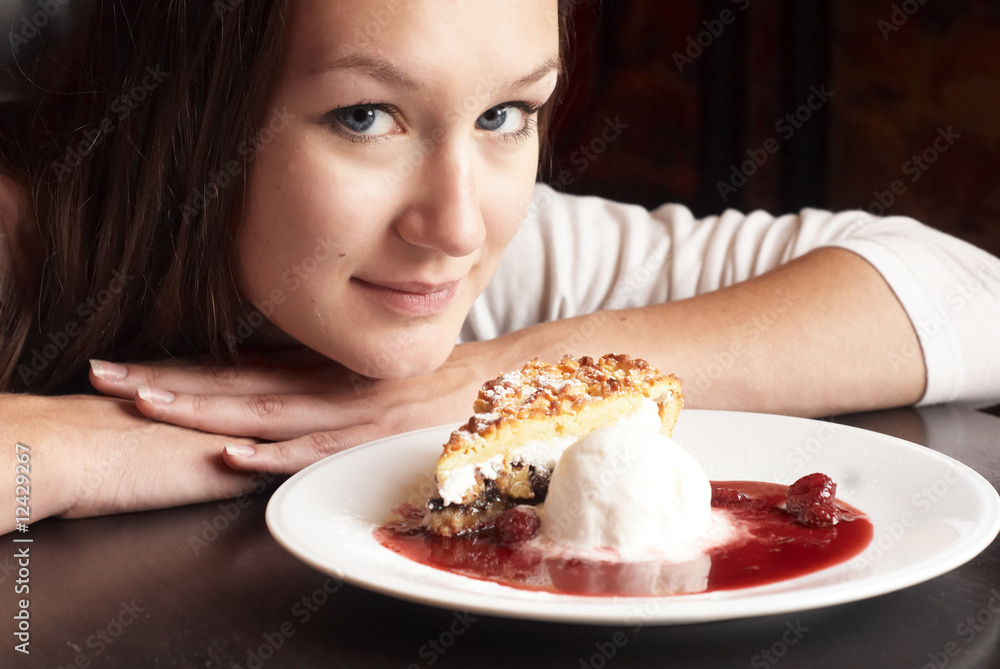 Woman with dessert cake and ice cream