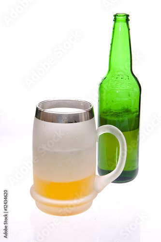 Beer mug and bottle on white background
