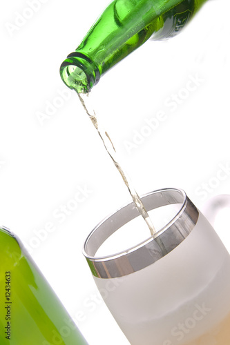 Beer mug and bottle on white background
