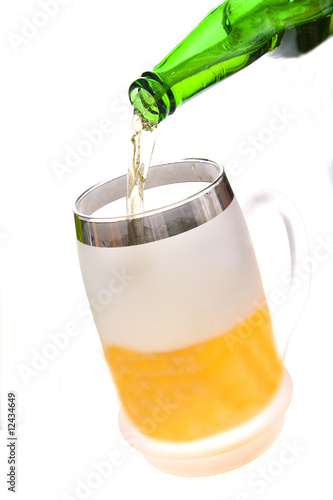 Beer mug and bottle on white background