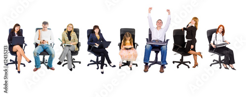 Several people in office chairs