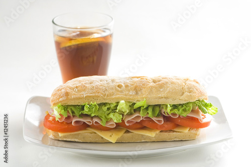 delicious sandwich of ham cheese lettuce tomato