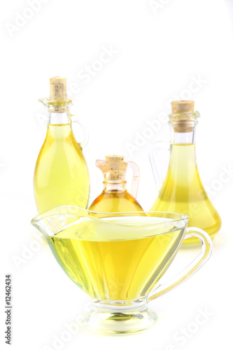 olive oil pitchers over white