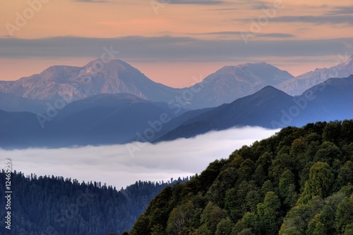 Mountains covered with fog