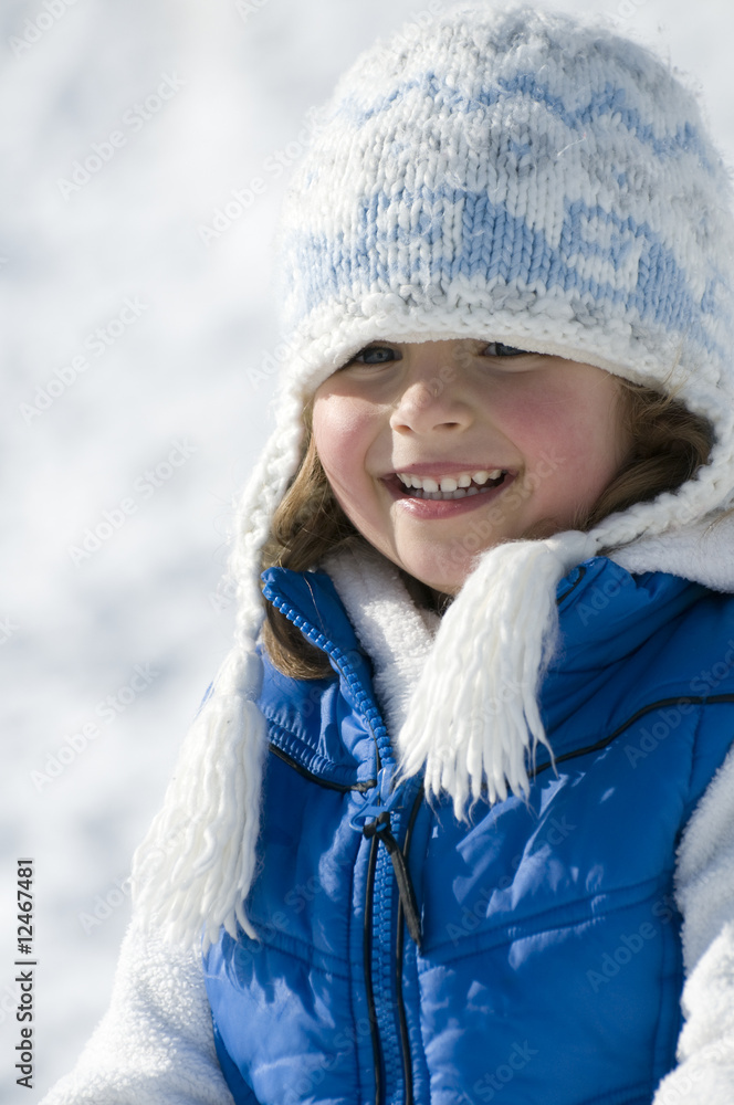 Cute girl playing in snow Cute girl playing in snow