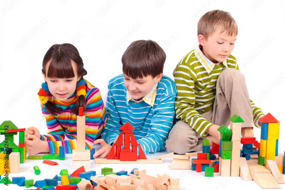 Fototapeta premium Children playing with blocks