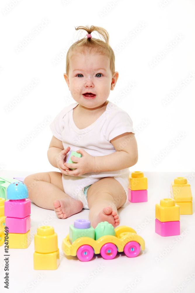 Baby playing with colored blocks Baby playing with colored blocks