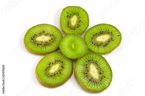 Slice of kiwi fruit on white background