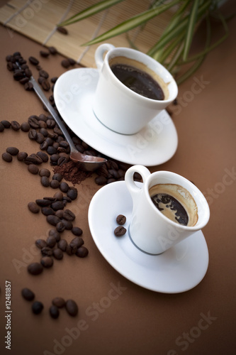 two esspresso caps of coffee